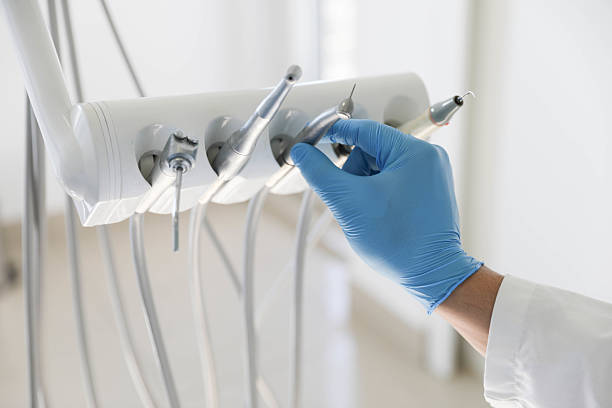 Professional Teeth Cleaning And Checkup technician working in Lowell, NC